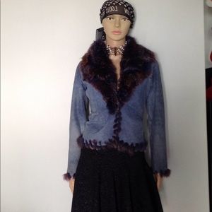 Cache. size 2 real leather /fur / removable